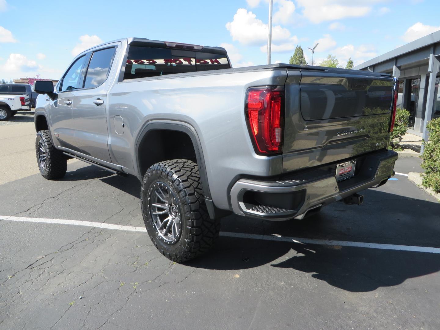 2019 CHARCOAL /BLACK GMC Sierra 1500 AT4 Crew Cab Long Box 4WD (1GTP9EEL6KZ) with an 6.2L V8 OHV 16V engine, 6A transmission, located at 2630 Grass Valley Highway, Auburn, CA, 95603, (530) 508-5100, 38.937893, -121.095482 - Dont miss this AT4 featuring a 4" RC lift kit kit, 35" Nitto Ridge Grappler tires, 20" Fuel Rebel wheels, Amp POwer steps, Air Bags, and a Tyger Bed cover. - Photo#6